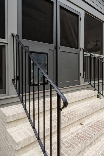 View of staircase on front of new home addition by Tru2Word Contracting. Serving the Greater Charleston area.